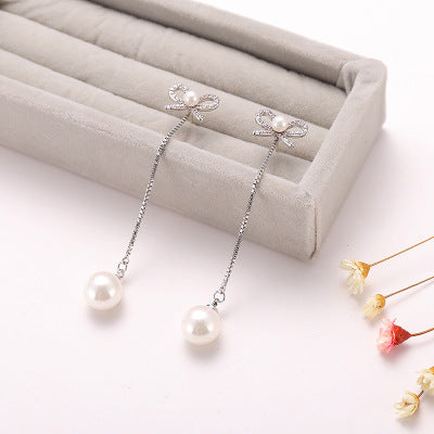 Sterling Silver Long Bow Pearl Earrings – Hypoallergenic Design
